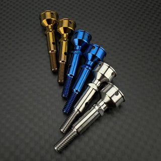 A set of R1WURKS ultra lightweight rear CVA axles in various colors including silver, blue, and gold, positioned on a textured dark background.