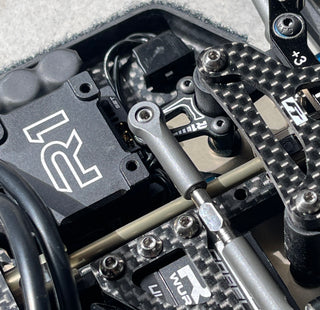 R1 RC10B74 steering bellcrank input arm installed on chassis